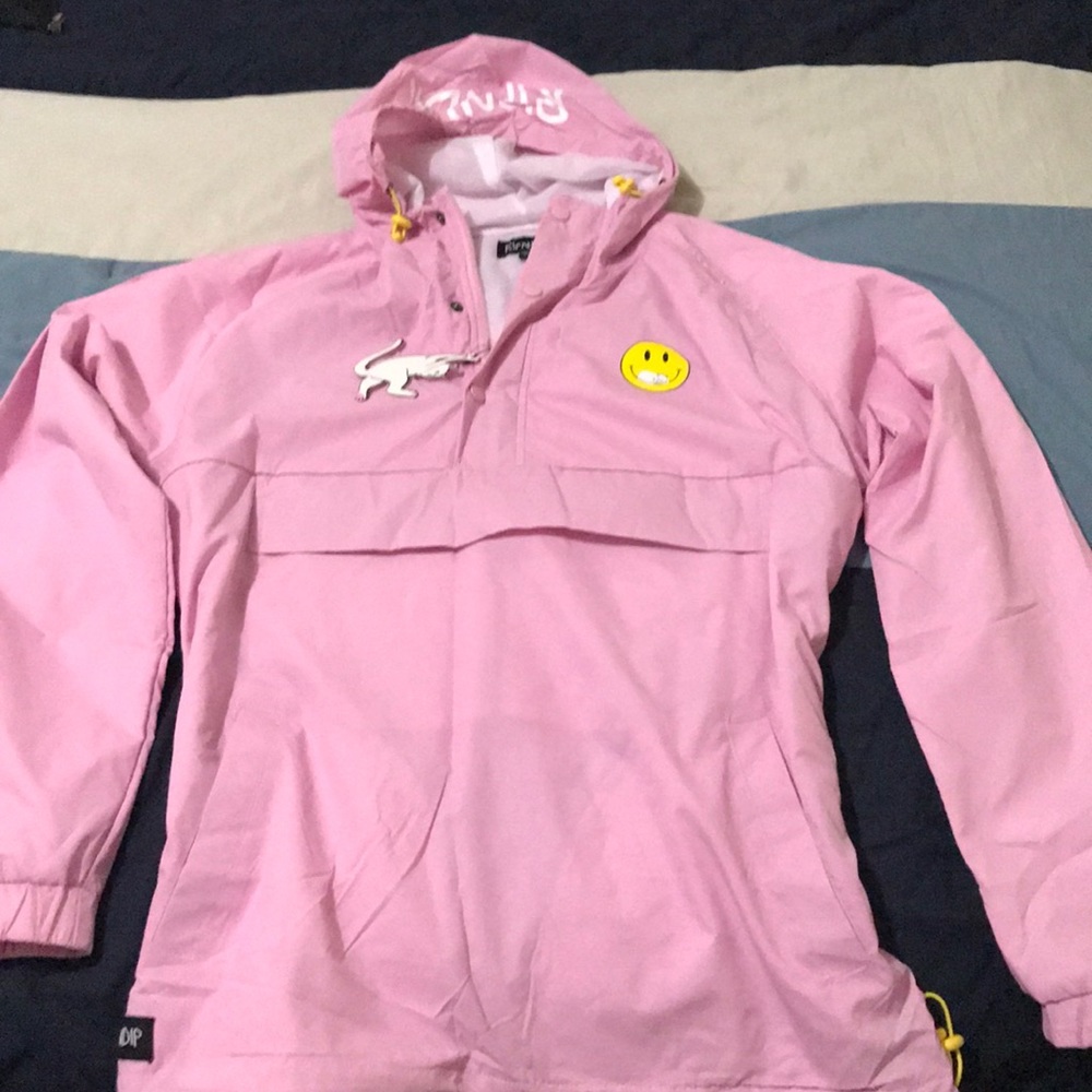 A brand new poncho from RipNDip never worn